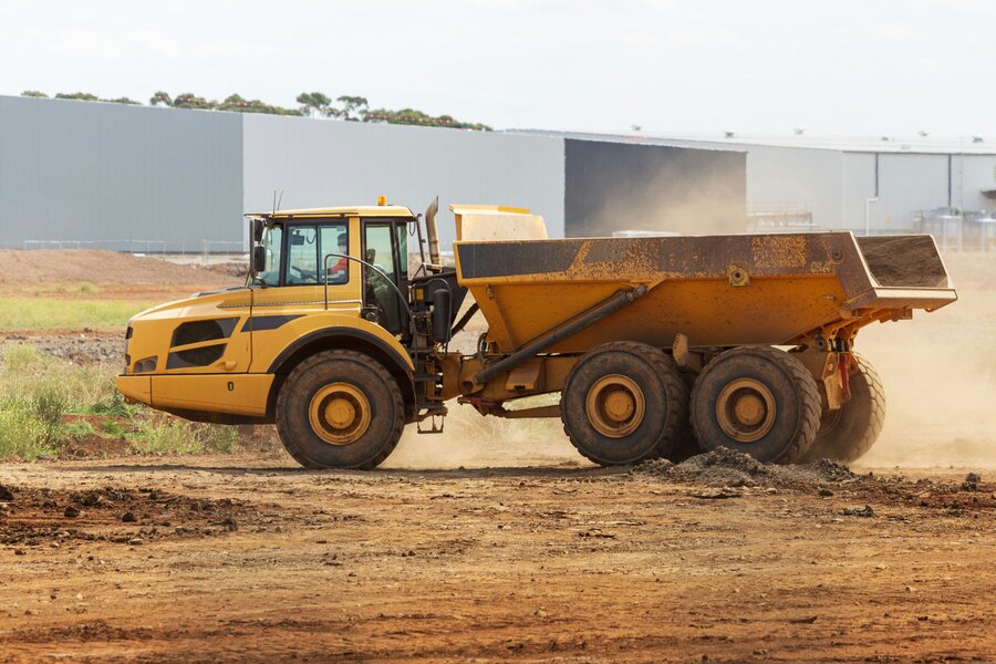 Dust liberation with a mining dump truck